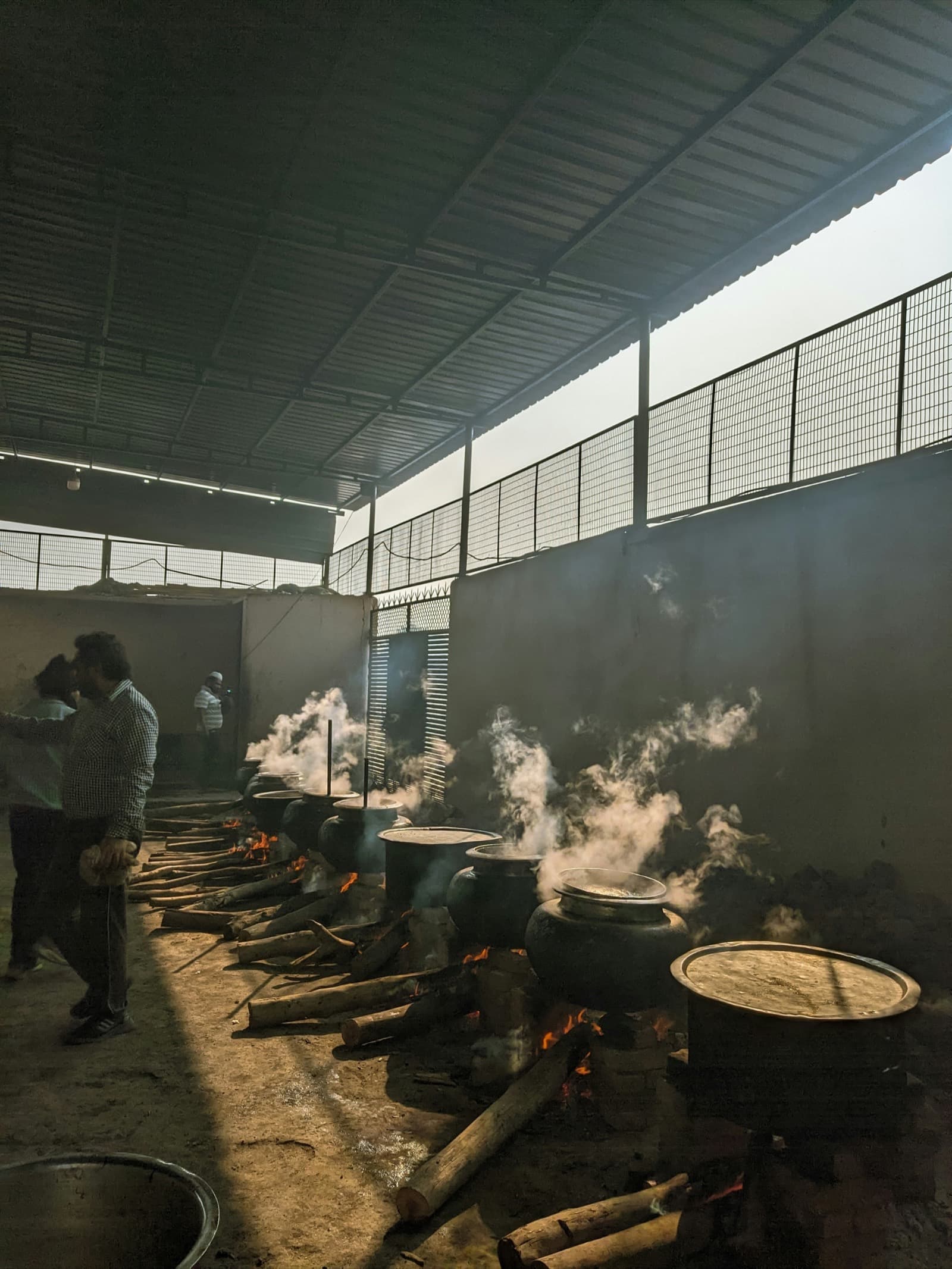 Workshop kilns in low light, smoke and warm tones